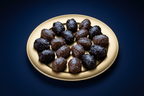 Coconut dates on solid gold plate - navy theme